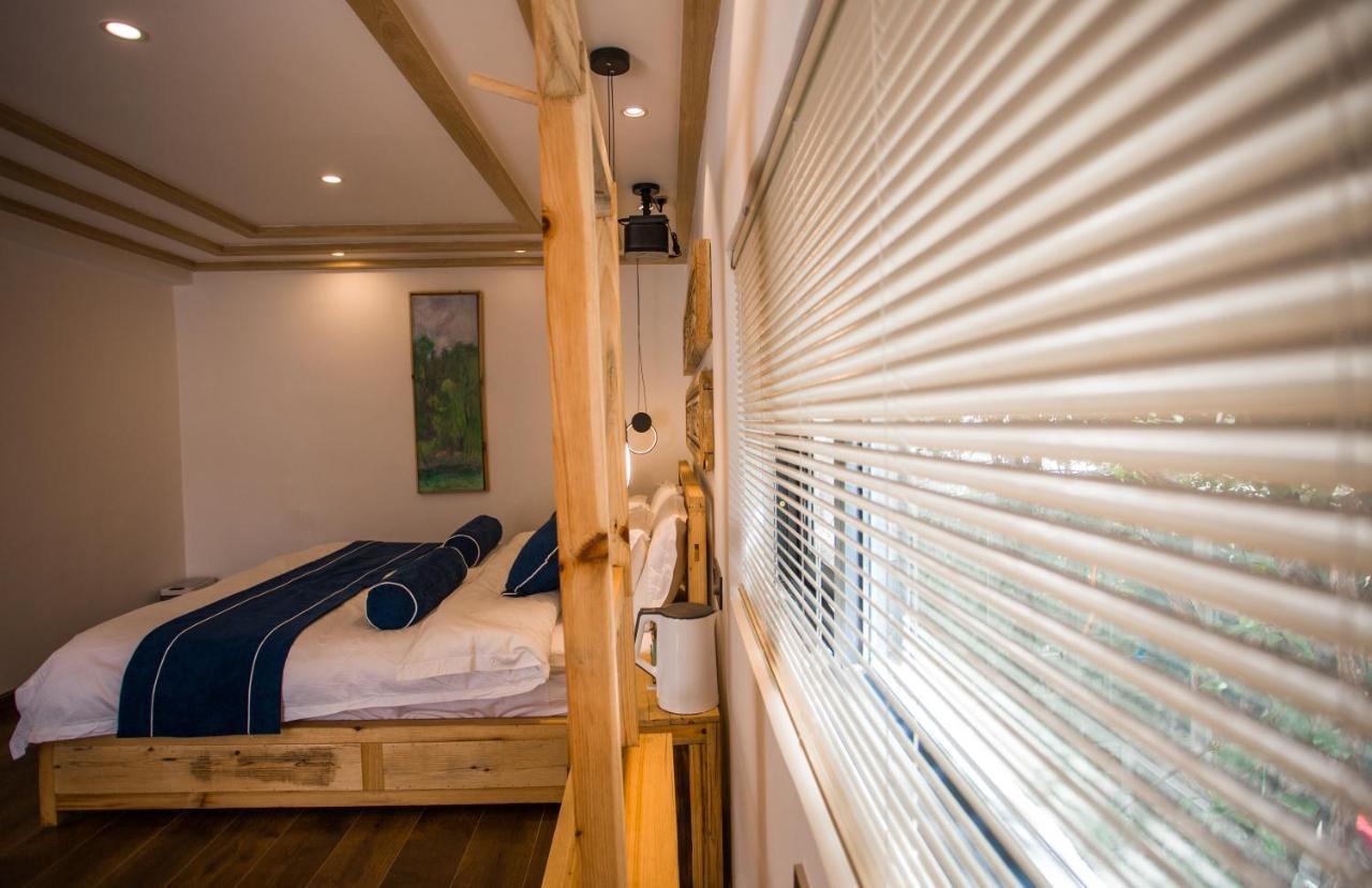Lijiang Yunqi Holiday Guesthouse ภายนอก รูปภาพ